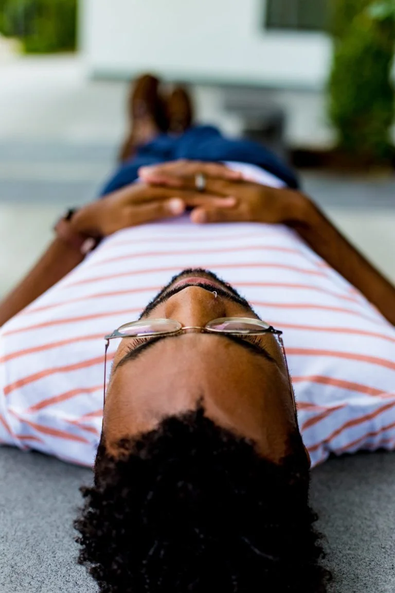 a person lying on a bed