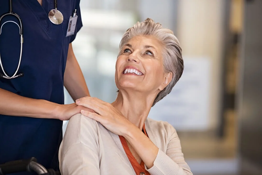 a doctor examining a woman's belly